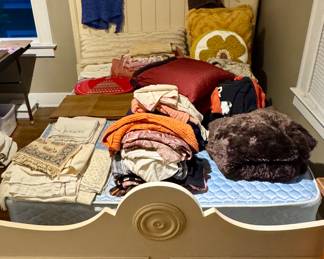 Vintage Bed Frame • Mattress • Sheets • Pillows • Blankets • Place Settings • Sweaters • Shirts • Handkerchiefs 