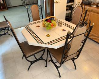Table and 6 chairs, 2 leaves.