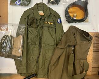 Korean jacket, duffle bags, ammo belt, dress hat with rifle badge and pins