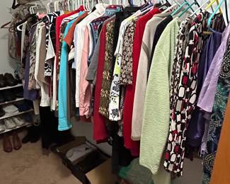 Woman’s Clothing, sizes varied from Small to XL.  Most appear to be Large and XL.