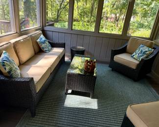 Beautiful Like New All Weather Wicker Weave Sofa, Chair with Ottoman, Rocker with Sunbrella Cushions, Coffee Table, Side Table and Small Round Table all with Beveled Glass on Top.  All Furniture includes Covers