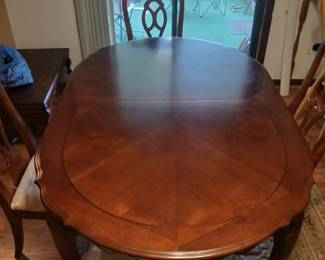 Oak Victorian style dining room set with chairs price negotiable
