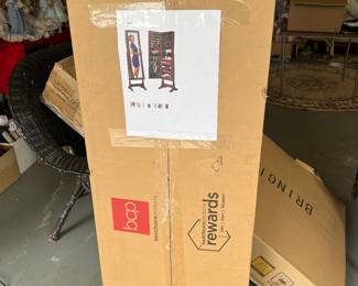 NIB jewelry mirror with storage cabinet