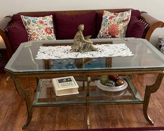 Heavy brass table w/glass top 
Items on table sold separately 