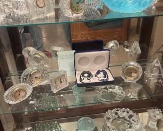 1635.  Glass Front Cabinet with Miscellaneous Crystal