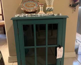 1668. Turquoise Cabinet with Pottery by Mackenzie Childs