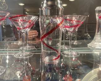 1634. Glass Front Cabinet with Red Swirl Glass & Decanter