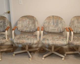 4 MATCHING KITCHEN/DINING CHAIRS ON CASTORS