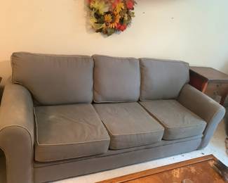 #8 hide a bed of sofa green 80 long $65.00