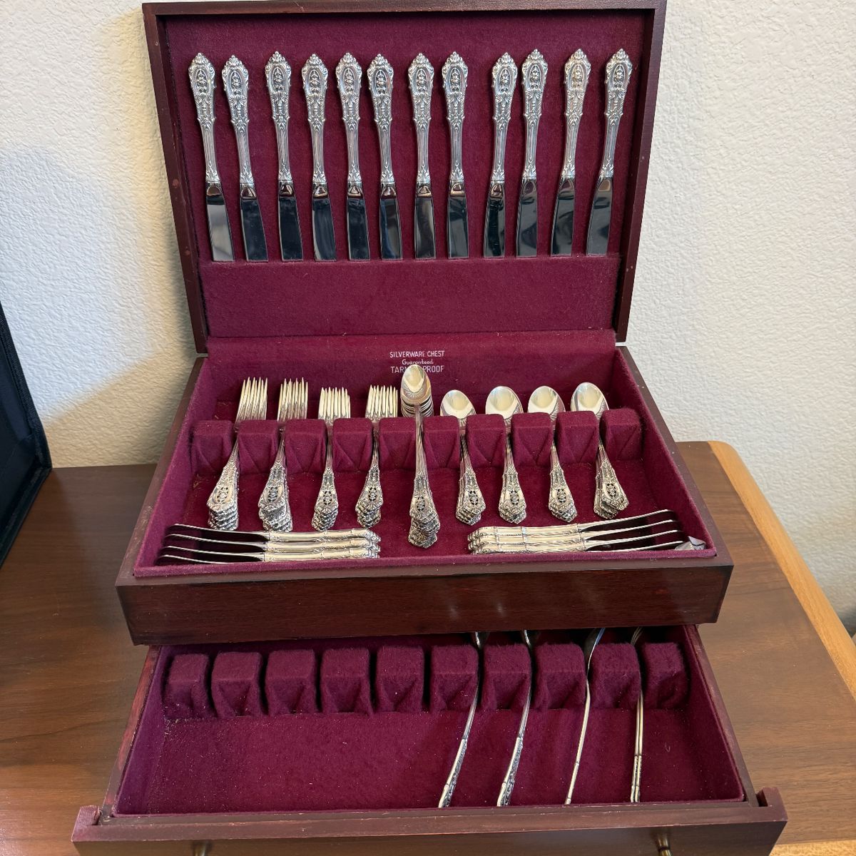 This beautiful flatware was designed by William S. Warren and is the best of 1930’s Art Deco design. Enough style and detail to be beautiful and interesting without being overstated. This set features 12 six piece place settings. This is an excellent engagement, wedding or anniversary gift for the couple who loves to entertain in style. Enjoy the many enduring benefits of sterling flatware including durability and natural anti-microbial properties. The set comes in a beautiful tarnish proof chest. 

Piece count with weights 

12 Dinner knives with a stainless blade
12 Dinner forks-18.26 ozt
12 Salad forks - 13.07 ozt
24 Teaspoons - 20.40 ozt
12 Iced teaspoons - 11.10 ozt
12 Spread spoons - 
2 Solid Serving Spoon - 4.34 ozt
1 Sugar Spoon+2 oyster forks 2.27 ozt

69.44 ozt without the knives or spreaders  