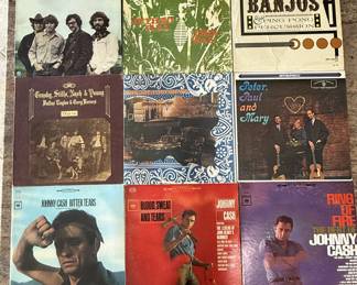 Vintage Vinyl Record Lot featuring albums from the 1960s and 1970s. Includes notable titles such as Johnny Cash's 'Bitter Tears', Creedence Clearwater Revival, and 'The Sound of Banjos'. See pictures for more details.