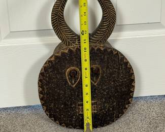 This hand carved Baoule African mask is a nod to Ms. Broyles international travel. A unique piece to add to your collection