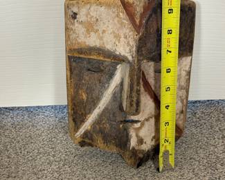 This is a unique artifact known as an African Passport Mask. It is an excellent example of the detail and the artistry of these objects