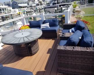 All-weather wicker conversation set; fire pit