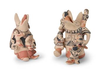 250
Stephanie "Snowflake Flower" C. Rhoades (1931-2018, Cochiti Pueblo)
Two Cochiti Pueblo Coyote storytellers "Coyote and the Winter Shawl", circa 1990s
Polychrome slip-glazed ceramic
Each with fringed shawl motifs and multiple attached figures, each titled and signed "Snowflake Flower" to underside, one dated 1990
Larger: 7.75" H x 6.25" W x 6.5" D; Smaller: 7.75" H x 4.5" W x 4.5" D
Estimate: $300 - $500