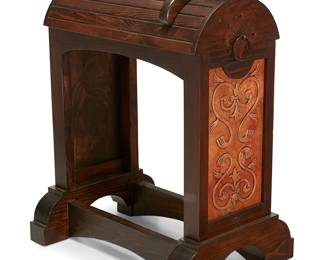 97
A wood and copper saddle stand
Late 20th century
The barrel form stand with a hammered copper inset to the front featuring scrolled motifs and a copper medallion with a ring, with a monogram to wood below
41.22" H x 21.75" W x 30" D
Estimate: $300 - $500