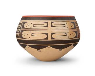 247
Stetson Setalla (b. 1962, Hopi-Tewa)
A polychrome pottery bowl, early 21st century
Signed with artist's raincloud motif: S. Setalla
The unburnished three-color bowl with red and brown banded geometric motifs above a band of raincloud motifs, on a cream slip
6.875" H x 9.75" Dia.
Estimate: $400 - $600