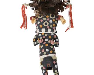 191
Clark Tenakhongva
(b. 1957, Hopi-Third Mesa-Hoat'Ve'La)
A Hopi Pueblo Third Mesa Kokosori/Zuni Fire God katsina
Polychrome painted cottonwood, feathers, corn husk, wool yarn
With multicolored spots overall, attached feathers and yarn-trimmed stick to top of mask, with corn husk earrings, signed to underside: C.W.T. / !!
16" H x 6.75" W x 3" D
Estimate: $300 - $500