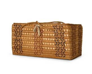 179
A polychrome Fraser/Thompson River basketry trunk
Early 20th century, Salish; Northern Washington/Southern British Columbia
The coiled woven lidded storage basket with overall imbricated ticking and geometric designs
with wrapped rawhide handles and lacing ties
8.75" H x 17" W x 10.25" D
Estimate: $400 - $600