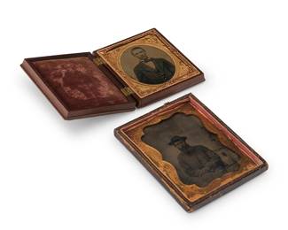 223
Two Civil War era tintypes
One tintype depicting a Union soldier, with a thin chased gold-toned metal preserver within a tooled leather case, and the other tintype of a man in a suit, with a thin chased gold-toned metal preserver, within a maroon velvet-lined thermoplastic case
Sight of smallest: 2.625" H x 2.25" W; Sight of largest: 3.5" H x 2.5" W
Estimate: $300 - $500