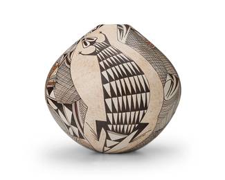 180
Sylvia "Featherwoman" Naha (1951-1999, Hopi-Tewa)
A polychrome pottery jar, late 20th century
Signed to underside with artist's feather cipher and: S
The three-color jar with red and brown lizard motifs alternating with hachured geometric motifs on a white slip ground
5.625" H x 5.875" Dia.
Estimate: $500 - $700