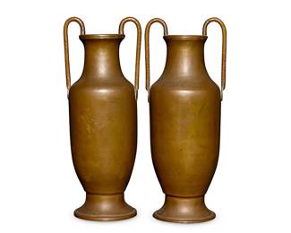 88
A pair of Dirk Van Erp Pair hammered copper urns
Circa 1915-1977; San Francisco, CA
Each base signed: Dirk van Erp / San Francisco [open-box mark]
Each footed vessel with opposed lug handles
2 pieces
Each: 17.125" H x 6.625" W x 6" D
Estimate: $2,000 - $3,000