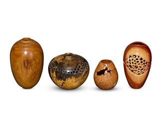 297
Three Bill Haskell turned wood vases
Early 21st century
Three signed and variously marked to identify the type of wood used: Bill Haskell; one etched: S. McClain / Maple Burl / 2011
Comprising an "Olive" wood footed vase, a "Buckeye" wood low vase with openwork to shoulder, and a "Carob" wood vase with openwork to body, together with a small burlwood vase
4 pieces
Tallest: 8.375" H x 5.5" Dia.; Shortest: 4.5" H x 3.875" Dia.
Estimate: $300 - $500