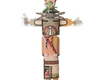 255
A Hopi Salako Mana katsina
Late 20th/21st century; Hopi Pueblo
Signed to base: KM X [unknown artist]
In polychromed cottonwood with green mask, thread earrings, and three-point stepped tableta with elaborate feathers
16" H x 10" W x 3" D
Estimate: $200 - $300