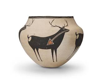 278
Lucy M. Lewis (1890-1992, Acoma Pueblo)
A polychrome pottery olla, late 20th century
Signed to underside: Lucy M. Lewis. / Acoma, N.M.
The jar depicting four heartline deer figures in black and orange on a white slip ground
5.75" H x 7.375" Dia.
Estimate: $700 - $900
