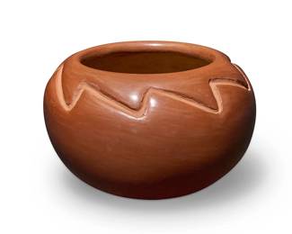 18
Rose Gonzales (1900-1989, San Ildefonso Pueblo)
A small redware bowl, mid/late 20th century
Etched signature to underside: Rose
The bowl with deeply incised zig-zag motif to shoulder
2.5" H x 3.75" Dia.
Estimate: $200 - $400