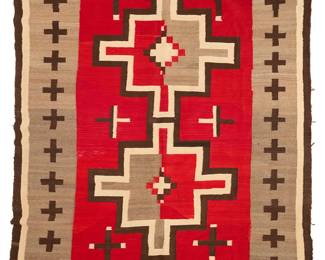 63
A Navajo regional rug
Early 20th century, Diné
Woven in red, cream, dark brown, light brown, and grey wool, with two central stepped crosses, and multiple floating Spider Woman crosses to corners
90" H x 65.5" W
Estimate: $1,000 - $1,500