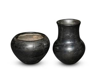 14
Desideria Montoya Sanchez (1889-1982, San Ildefonso Pueblo)
Two blackware pottery vessels, early/mid-20th century
Each with incised signature to underside: Desideria; one further inscribed: San Ildefonso
Each with black on black decorations, comprising a low jar with banded stacked arrow motifs to shoulder, and a jar with flared rim and banded kiva step motifs
2 pieces
Lower: 4.375" H x 6.625" Dia.; Taller: 6.875" H x 5.5" Dia.
Estimate: $200 - $400
