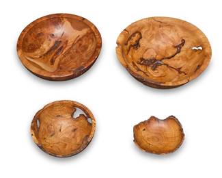 299
Four Andrew Pearce turned wood bowls
Early 21st century
Each with a variation of artist's burned shop mark
Each burlwood bowl with live edge elements to rim
4 pieces
Largest: 4.375" H x 12.5" Dia.; Smallest: 2.5" H x 6" W x 5.125" D
Estimate: $300 - $500