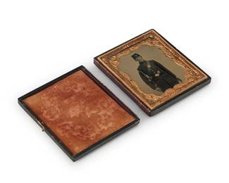227
A Civil War era tintype
A tintype depicting a Union soldier posed with his rifle, housed in a chased gold-toned metal preserver within a burnt orange velvet-lined tooled leather case
Sight: 2.5" H x 2.125" W
Estimate: $300 - $500