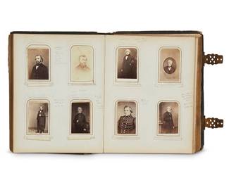 212
A late 19th century Victorian leather bound photo album
The album bound in dark green tooled leather with gilt metal clasps, with gilt page edges containing portrait photographs and lithographs, together with an assortment of loose photos, all in plastic sheet protectors; front end paper inscribed in pencil: "This was Hiram Cranston's own portrait album of personal friends"
12.5" H x 10.125" W x 2.375" D
Estimate: $2,000 - $3,000
