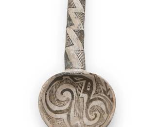 303
An Anasazi/Ancestral Pueblo pottery ladle
Pre-1500 CE
With black on white geometric and Tularosa-style motifs to bowl and to handle
7" H x 3.25" W x 1.75" D
Estimate: $300 - $500