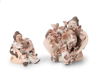 252
Robin Teller (b. 1954, Isleta Pueblo)
Two polychrome slip-glazed pottery storyteller figures, late 20th/21st century
Each signed to underside: Robin Teller / Isleta Pueblo / New Mexico
Comprising a large elaborate storyteller with long braided hair and a blanket, holding a pottery bowl, and with multiple groupings of figures, animals and other elements including a bald eagle, as well as a smaller storyteller figure with a blanket holding a basket of corn and acorns, with multiple figures including squirrels
2 pieces
Larger: 8.25" H x 8.5" W x 8.5" D; Smaller: 5.75" H x 4.5" W x 5.5" D approximately
Estimate: $300 - $500