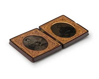 230
Two Civil War era early photographs framed together
Two framed early photographs depicting a husband and wife before the Civil War; the wife shown in a daguerreotype and the husband in a tintype; both set in a chased gold-toned metal preservers within a single thermoplastic case
Sight of each: 2.5" H x 2" W
Estimate: $400 - $600