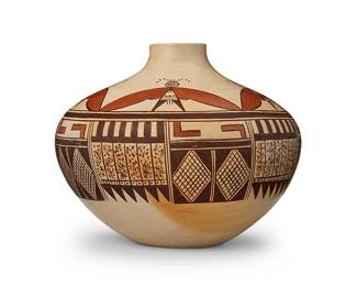 127
Tonita Nampeyo (1934-2020, Hopi-Tewa)
A polychrome yellowware pottery jar, mid-20th century
Signed to underside with artist's corn cipher: Tonita Nampeyo
The three-color jar with red and brown moth motif to shoulder above banded geometric motifs, on a cream slip ground
5.5" H x 6.625" Dia.
Estimate: $300 - $500