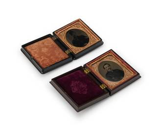 222
Two Civil War era tintypes
One depicting a soldier in uniform, and the other of a distinguished young chap, both with a thin chased gold-toned metal preserver, the soldier within a burnt orange velvet-lined black thermoplastic case, the young chap within a similar case, but lined with Magenta velvet
Sight of each: 2" H x 1.5" W
Estimate: $300 - $500