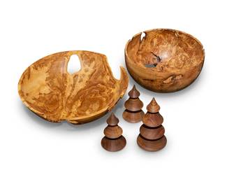 298
A group of Andrew Pearce turned wood items
Early 21st century
Each with artist's burned shop mark; trees with burned signature: Andrew Pearce
Comprising two burlwood bowls and three tree-form figures
5 pieces
Taller bowl: 6" H x 11.5" Dia.; Shorter bowl: 4.5" H x 15.25" Dia.; Largest tree: 8.25" H x 3.75" Dia.
Estimate: $300 - $500