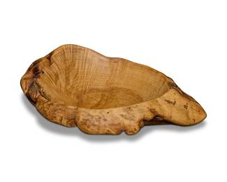 295
A large Andrew Pearce turned wood centerpiece bowl
Early 21st century
With artist's burned shop mark to underside
The burlwood footed bowl with smoothed live edge rim
7.375" H x 23.5" W x 18.5" D
Estimate: $200 - $300