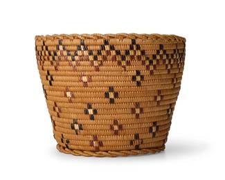 178
A polychrome Thompson River basket
Mid-20th century, Salish; Northern Washington/Southern British Columbia
The coiled tall basket with decorative twisted rim and imbricated zigzag banding and small floating cross motifs
9" H x 12" Dia.
Estimate: $300 - $500