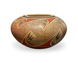 121
Fannie Nampeyo (1900-1987, Hopi-Tewa)
A yellowware pottery jar, mid-20th century
Signed to underside: Fannie Nampeyo
The three-color jar with brown and red migration motif
6.25" H x 11.25" Dia.
Estimate: $1,000 - $1,500