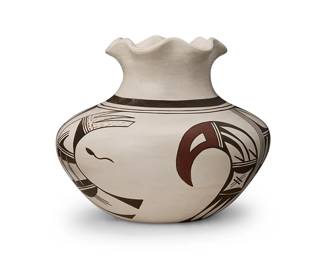 182
Joy "Frog Woman" Navasie (1919-2012, Hopi-Tewa)
A Hopi/Tewa polychrome pottery jar, mid/late 20th century
Signed with the artist's frog cypher to underside
The stone-polished bulbous form jar with a fluted rim, with multiple multi-directional directional bands of geometric and stylized pictorial motifs such as feathers, in black and red
5" H x 6" Dia.
Estimate: $400 - $600