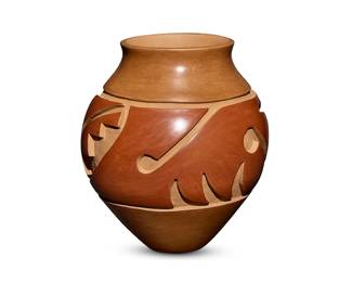 51
Jason Ebelacker (b. 1980, Santa Clara Pueblo)
A Santa Clara redware pottery vase, late 20th/21st century
With incised signature to underside: J L Ebelacker / Santa Clara Pueblo
A tall ovoid form jar with a band of deeply carved curvilinear and stepped motifs
10.75" H x 9.5" Dia.
Estimate: $600 - $900