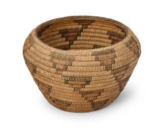 199
A large polychrome Pima basket
Early/mid-20th century, Akimel O'odham; Southwest United States
The coiled tapered shouldered bowl with multiple diagonal columns of stacked stepped triangles
8.75" H x 14" Dia.
Estimate: $300 - $500