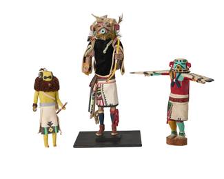 257
Three Hopi/Zuni polychrome katsina figures
Late 20th century
One etched to underside of base: Earl Arthur / Hopi / Eagle
The painted carved cottonwood figures, comprising one Hopi eagle katsina by Early Arthur (20th century), a Zuni warrior katsina with articulated arms and painted canvas skirt, depicted with a rattle and whip, and another Zuni warrior katsina with fabric and feather adornments, depicted with a bow and set in a custom metal stand
3 pieces
Tallest with stand: 16" H x 8" W x 8" D; Shortest: 9.25" H x 4.25" W x 3.375" D
Estimate: $500 - $700