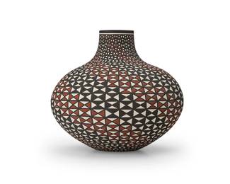 283
Paula Estevan (b. 1967, Acoma Pueblo)
A polychrome pottery jar, early 21st century
Signed and inscribed to underside: P. Estevan / [four dot cipher] / Acoma, NM [illegible]
The three-color jar with wide body and red and black repeated triangle motifs in a swirling color schema, over a white slip ground
5.5" x 5.875"
Estimate: $200 - $400
