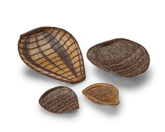 175
A group of Northern California winnowing tray baskets and beaters
Mid/late 20th century
Four twined basketry items comprising two large openwork winnowing trays, one with a matching twined seed beater, and one polychrome tray with an additional seed beater
4 pieces
Largest tray: 21" H x 16" W x 6.5" D; Smallest: 18.25" H x 15.5" W x 4.5" D; Beaters: 10.75" H x 8" W & 9.5" H x 8.5" W
Estimate: $300 - $500